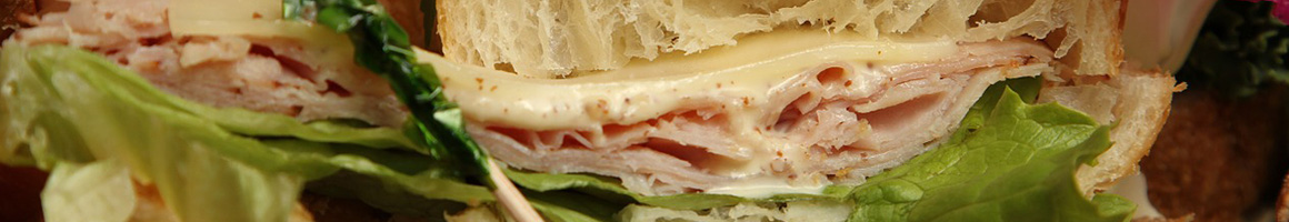 Eating American (Traditional) Breakfast & Brunch Sandwich at Mason-Dixon Cafe & Baking Co. restaurant in Fredericksburg, VA.